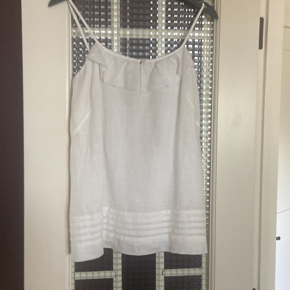 Ann Taylor Loft white linen top. Size 8P but very roomy. Never been worn. As new
